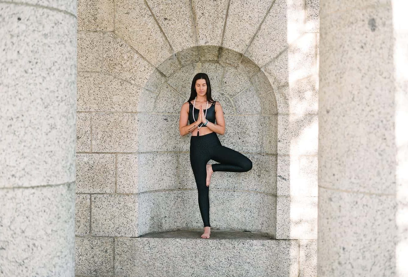 woman in yoga tree pose